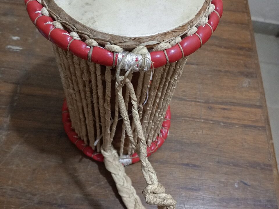 Placeholder: a hand-made talking drum